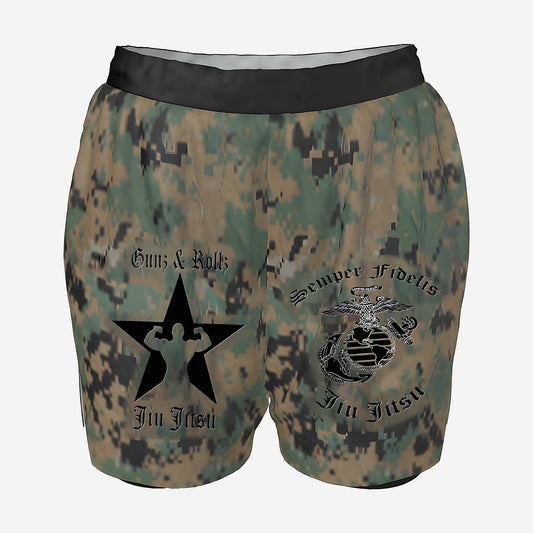 Women's Marine Corps camo grappling shorts by Gunz & Rollz with black waistband and compression liner, Marine Corps-inspired Jiu Jitsu logo and Gunz & Rollz star logo